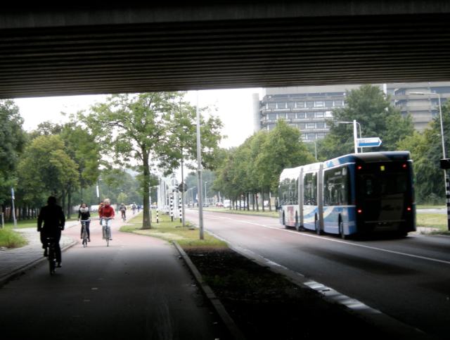 The cycle track ran alongside a bus-only corridor route. Note double bendy bus